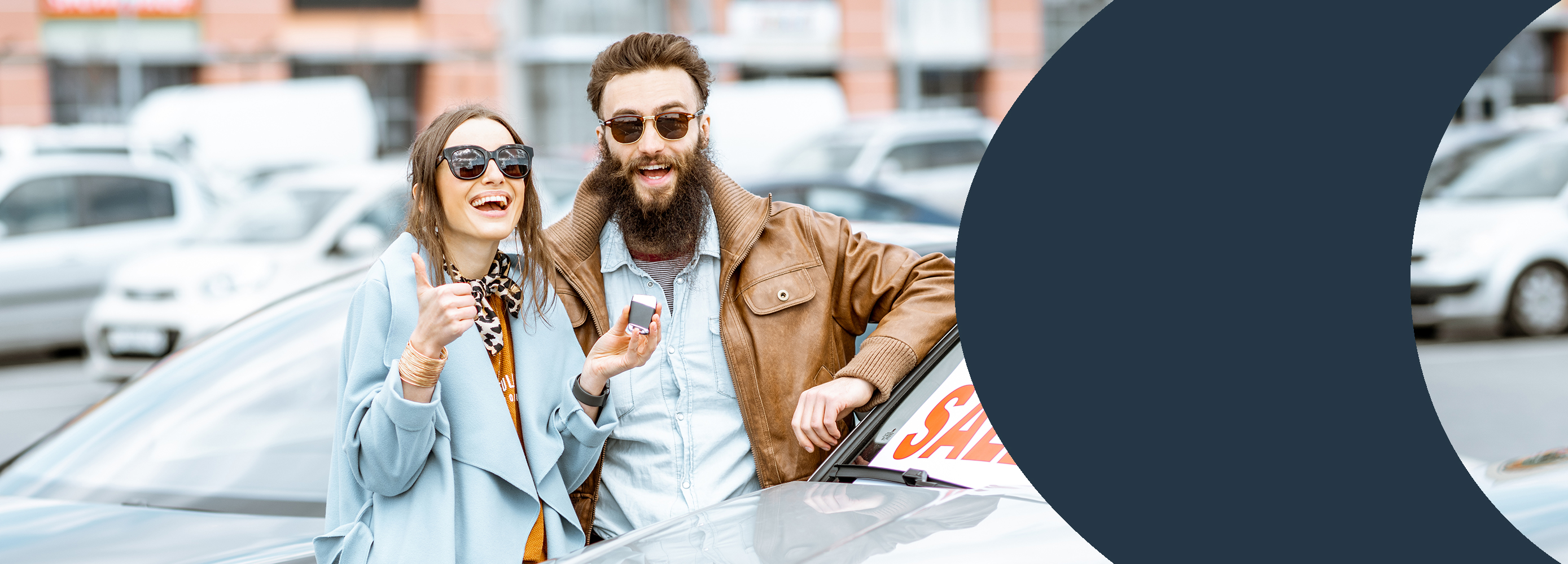 Young couple with car - click here for auto rates and online application