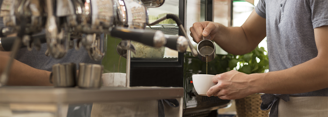 Barista making a coffee. 