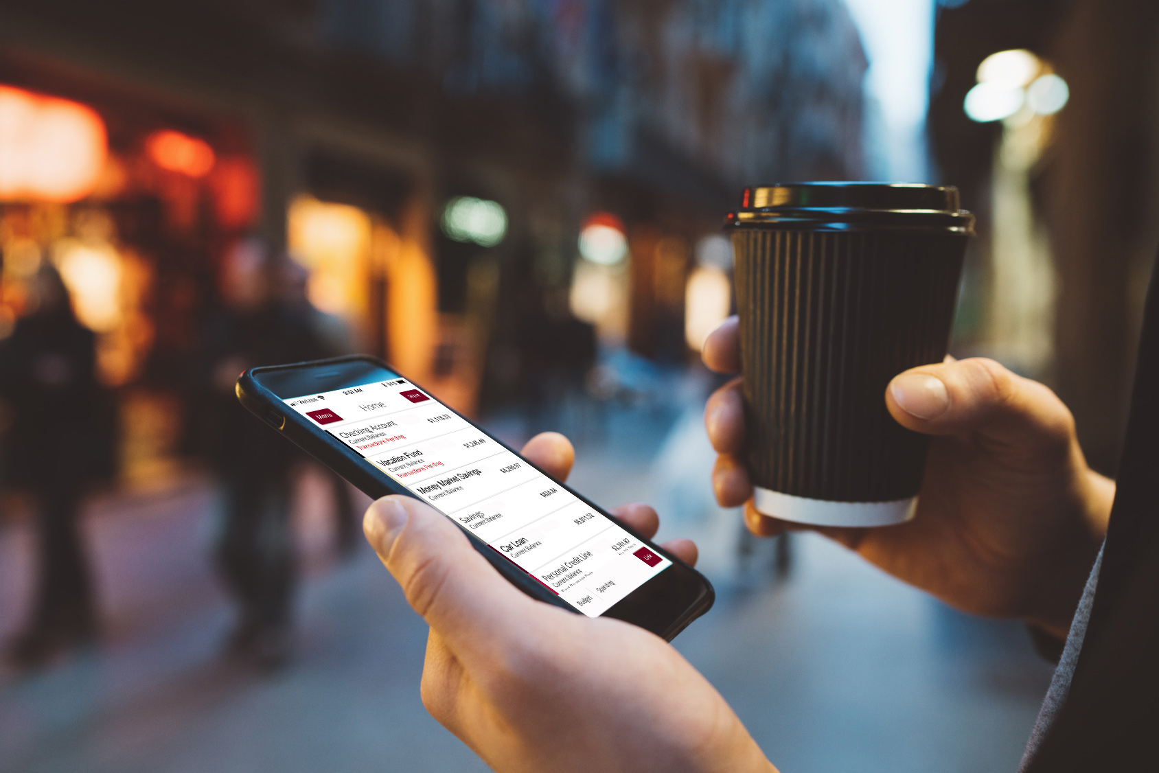 Guy with phone and coffee