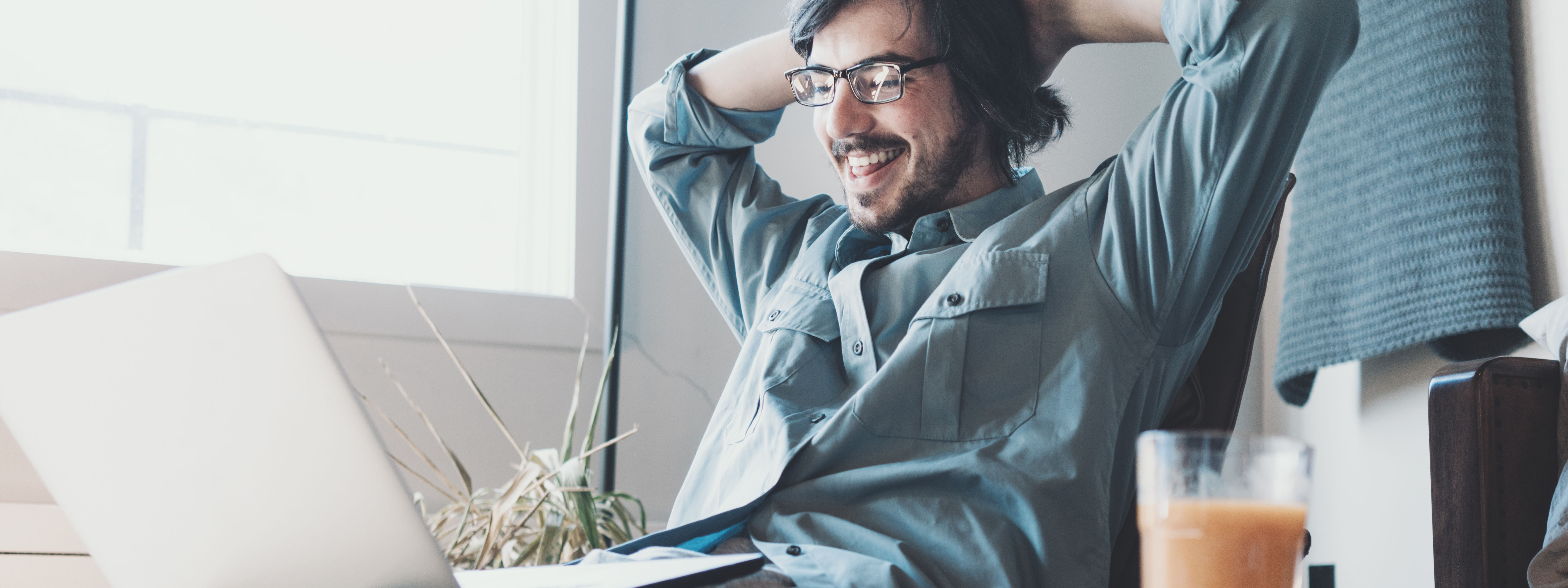 Man happy on laptop