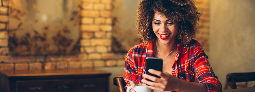 Young lady using mobile app